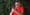 my head superimposed on an old lady's body who is looking at and holding a smartphone